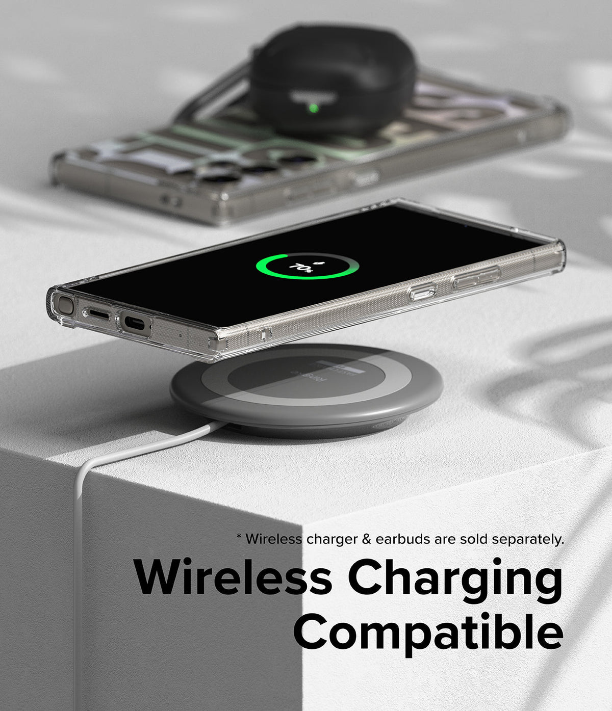 Galaxy S24 Ultra Case | Fusion Design - Clear phone case on a wireless charging pad showing a 70% battery icon.
