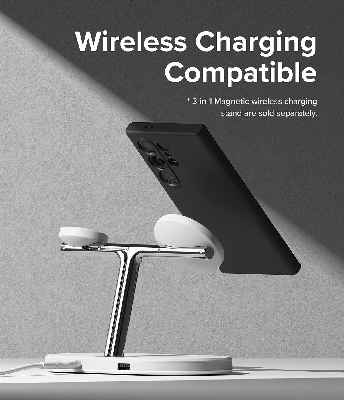 Galaxy S24 Ultra Case | Silicone Magnetic - Black phone case attached to a chrome 3-in-1 magnetic wireless charger.