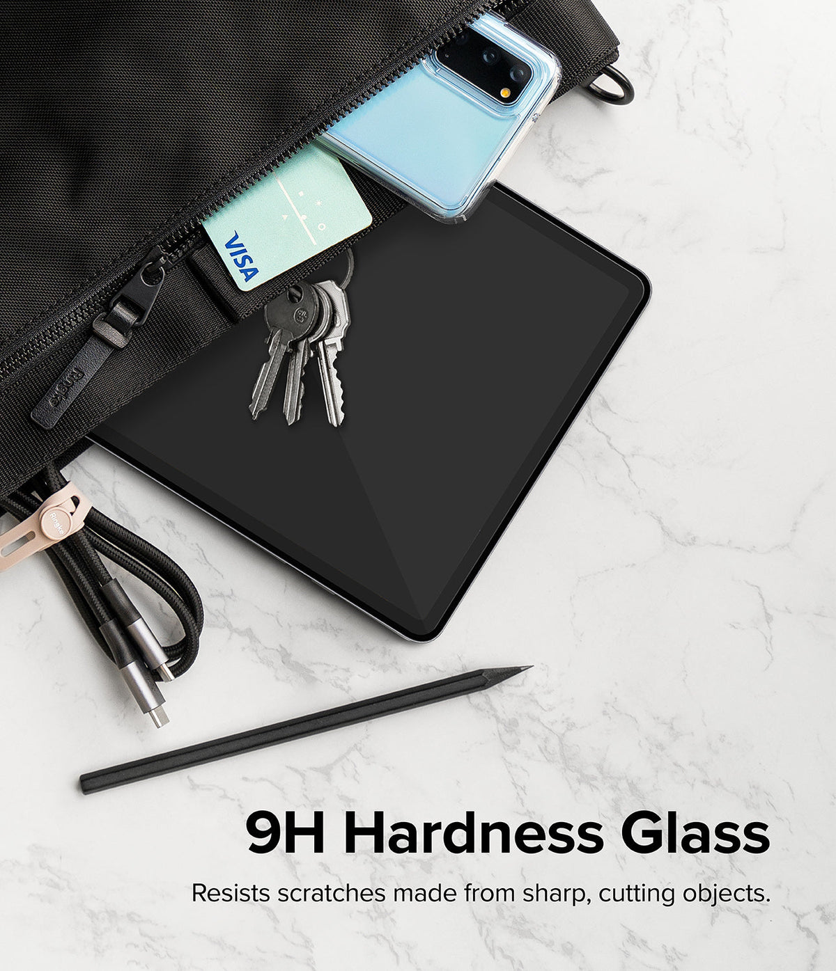 Galaxy Tab S10 Plus / Tab S9 Plus / Tab S8 Plus / Tab S7 Plus / Tab S7 FE | Invisible Defender Glass - Galaxy Tab S10 Plus Invisible Defender Glass - Tablet in a bag with keys and cards to demonstrate 9H scratch resistance.