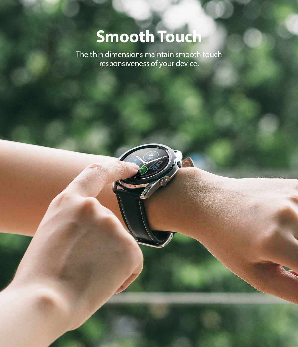 Galaxy Watch 3 45mm Screen Protector | Glass - A person touching the screen of a Galaxy Watch 3 against a blurred green background.