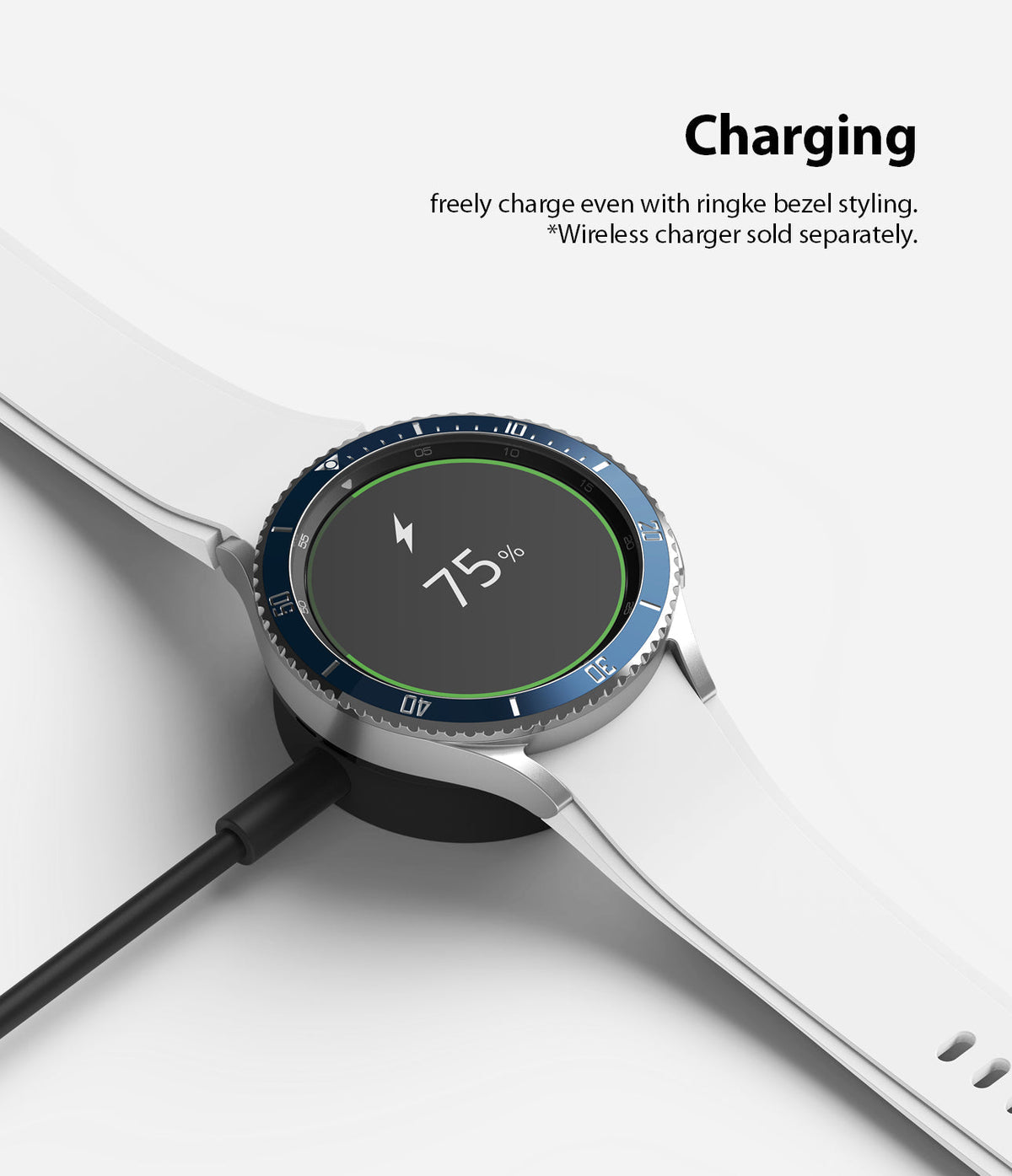 Galaxy Watch 4 Classic 42mm | Bezel Styling - A Galaxy Watch with a blue bezel ring charging wirelessly at 75% battery.