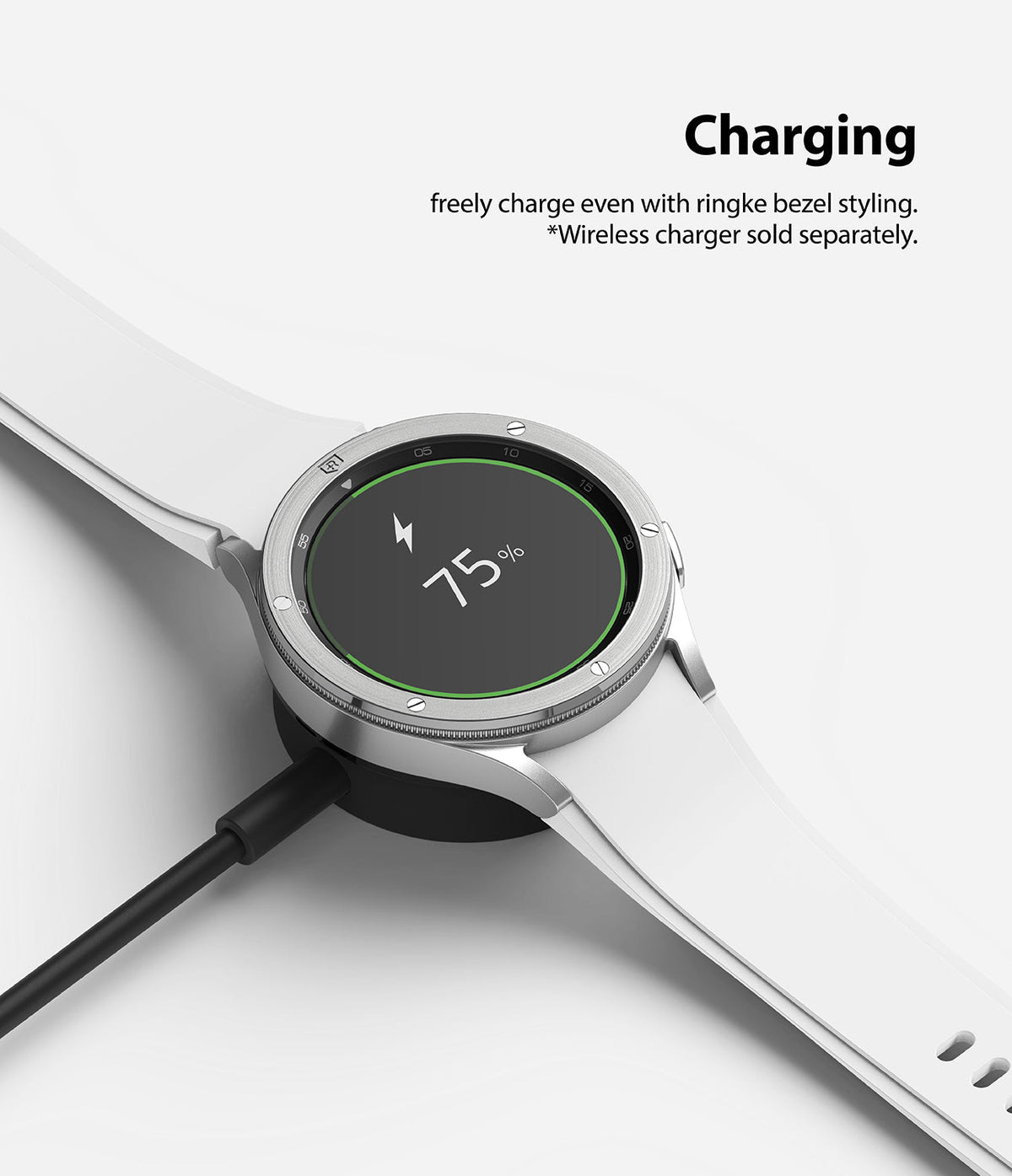 Galaxy Watch 4 Classic 42mm | Bezel Styling - Smartwatch with silver bezel styling charging on a wireless dock.
