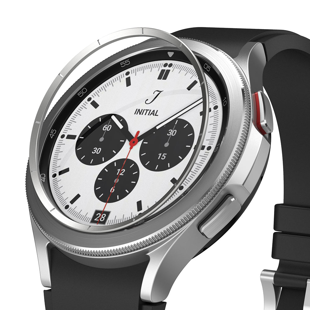 Galaxy Watch 4 Classic 42mm | Inner Bezel Styling - Silver metal bezel ring hovering above a smartwatch face.