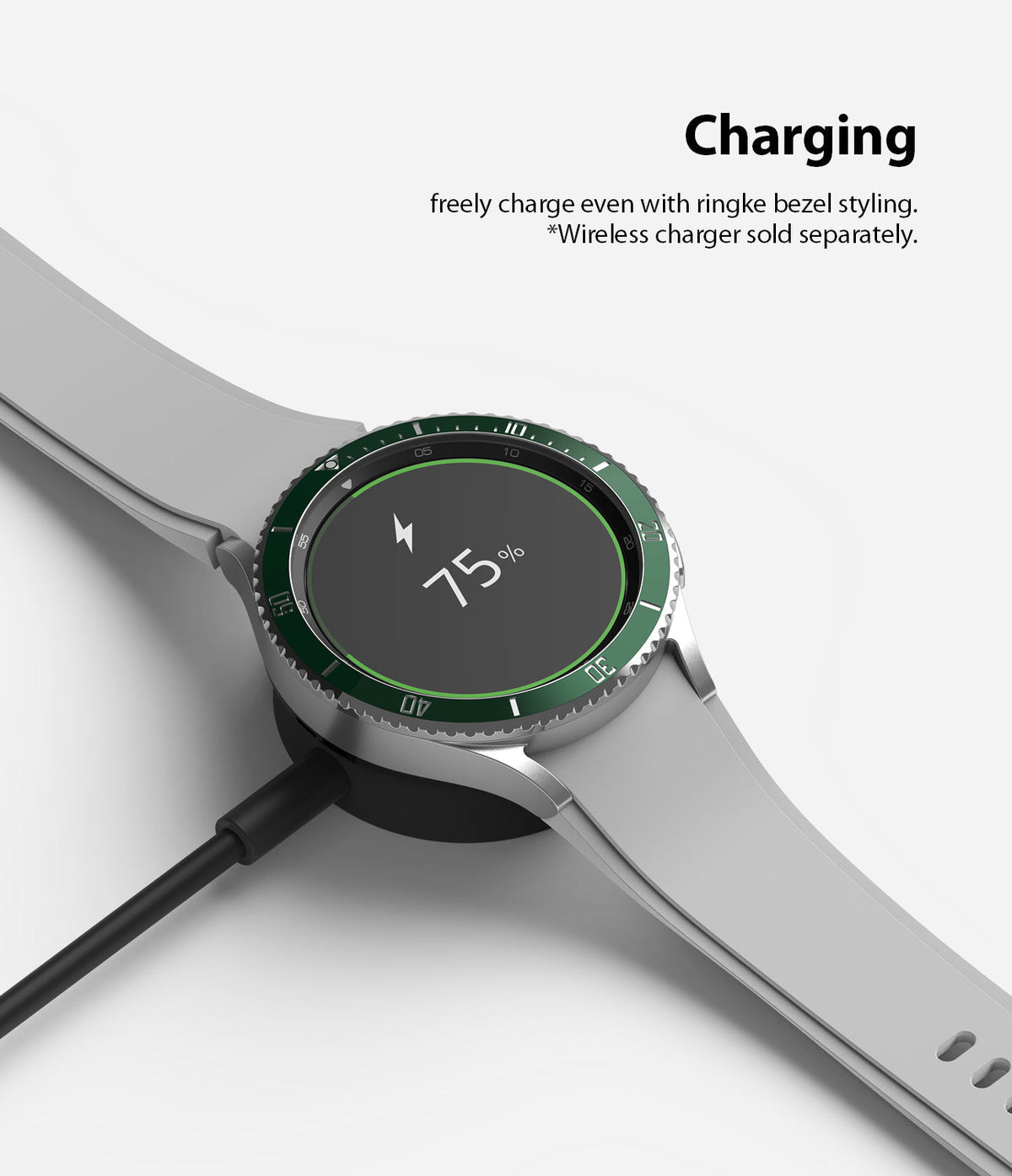 Galaxy Watch 4 Classic 46mm | Bezel Styling - Smartwatch with green bezel styling charging on a wireless dock.
