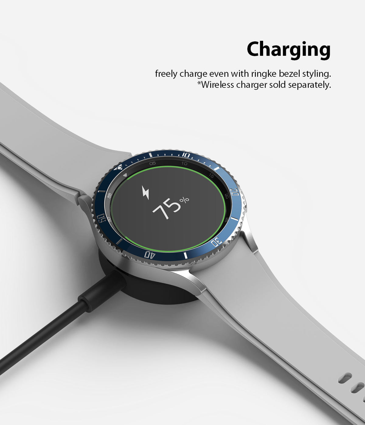 Galaxy Watch 4 Classic 46mm | Bezel Styling - Smartwatch with blue bezel styling charging on a wireless dock.