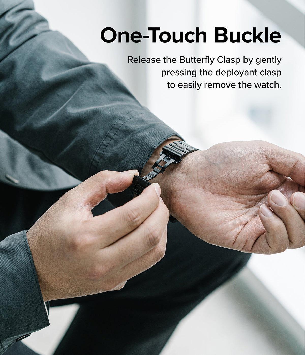 Galaxy Watch 4 Classic 42mm | Metal One Band - Hands opening the black butterfly clasp on a metal watch band.