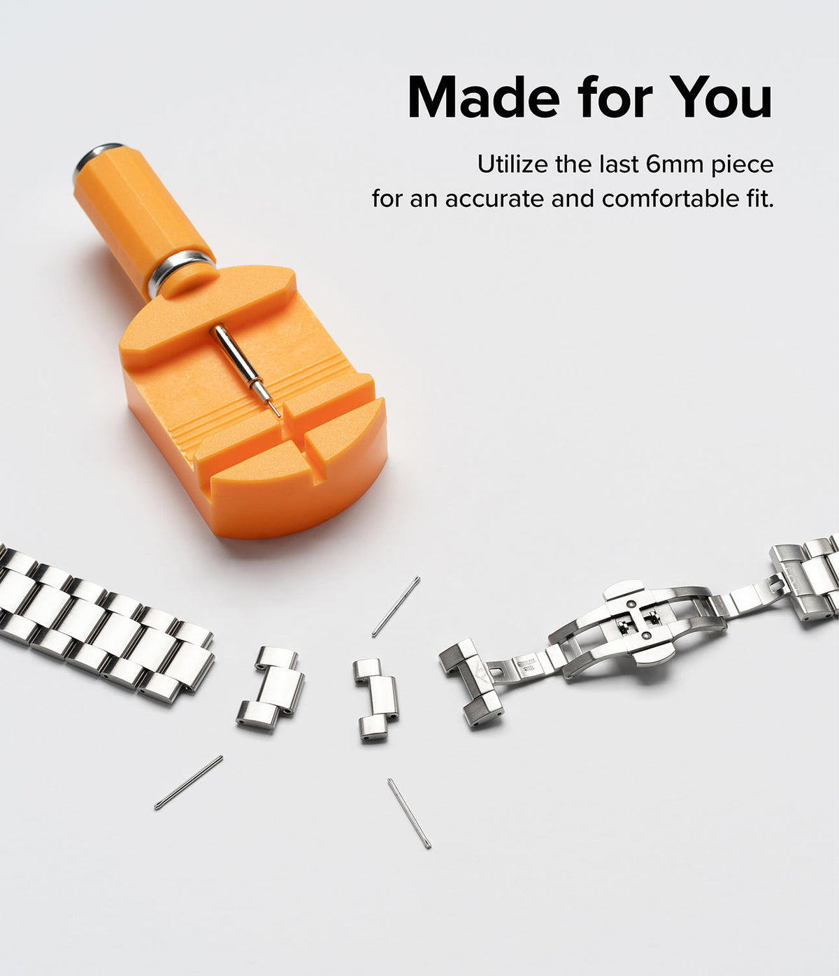 Galaxy Watch 4 Classic 42mm | Metal One Band - Orange watch band adjustment tool with metal links and pins on white.