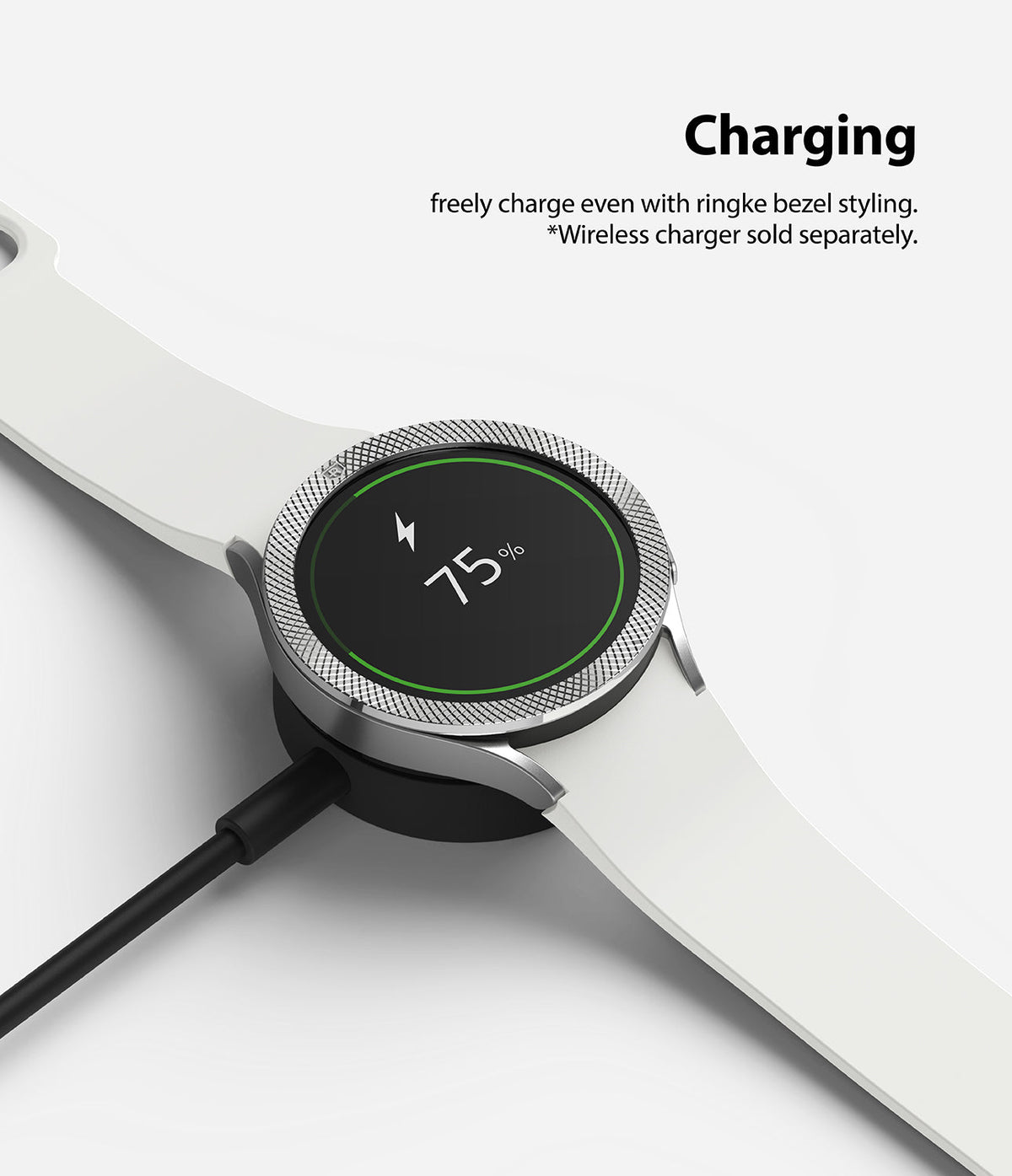 Galaxy Watch 5 / 4 (40mm) | Bezel Premium Styling - Smartwatch with silver bezel ring charging on a wireless dock.