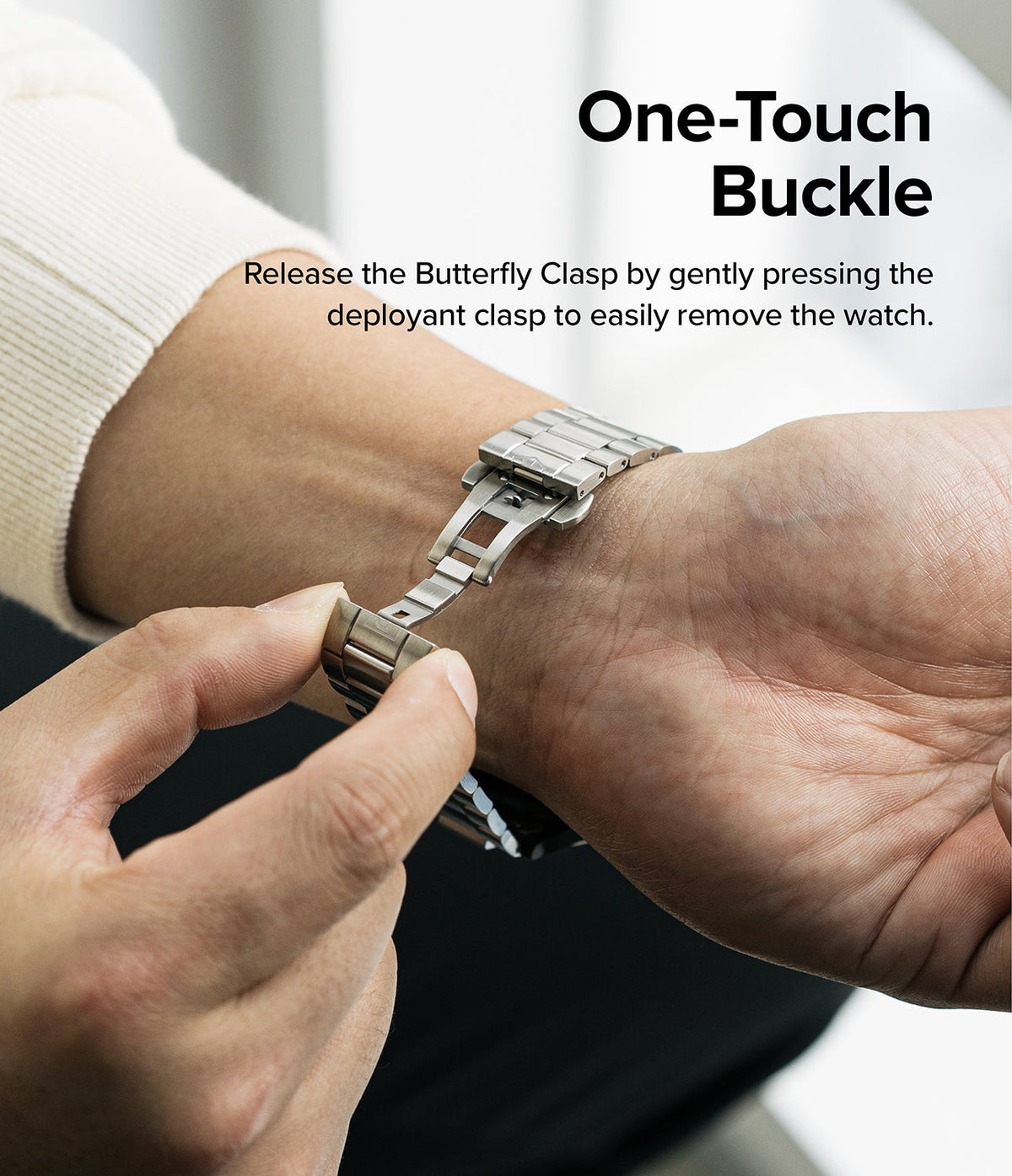 Galaxy Watch 6 / 5 / 4 (44mm) | Metal One Band - Hands demonstrating the one-touch butterfly clasp release on a metal watch band.