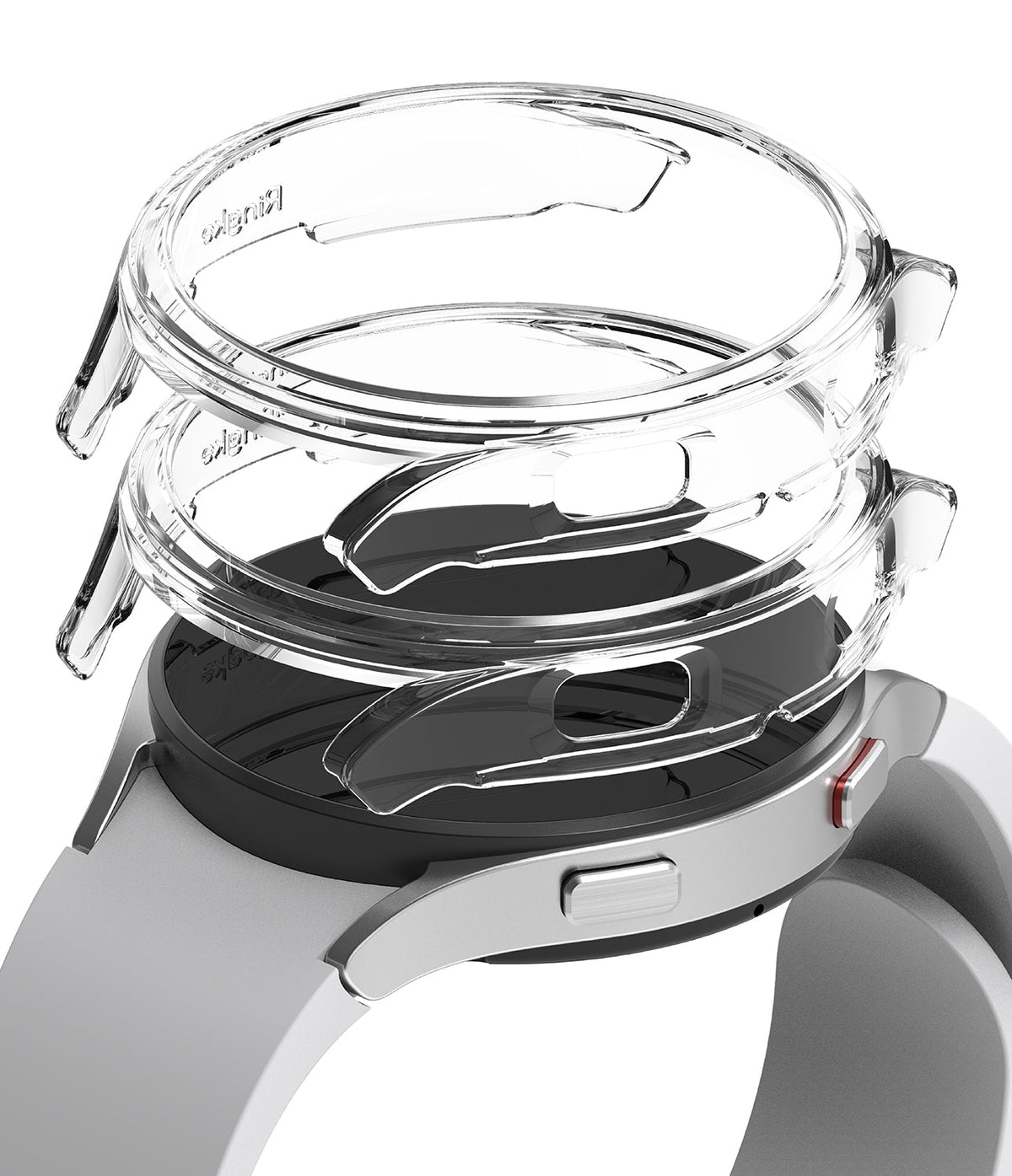 Galaxy Watch 4 (44mm) Case | Slim - Two transparent protective cases hovering above a silver Galaxy Watch 4.