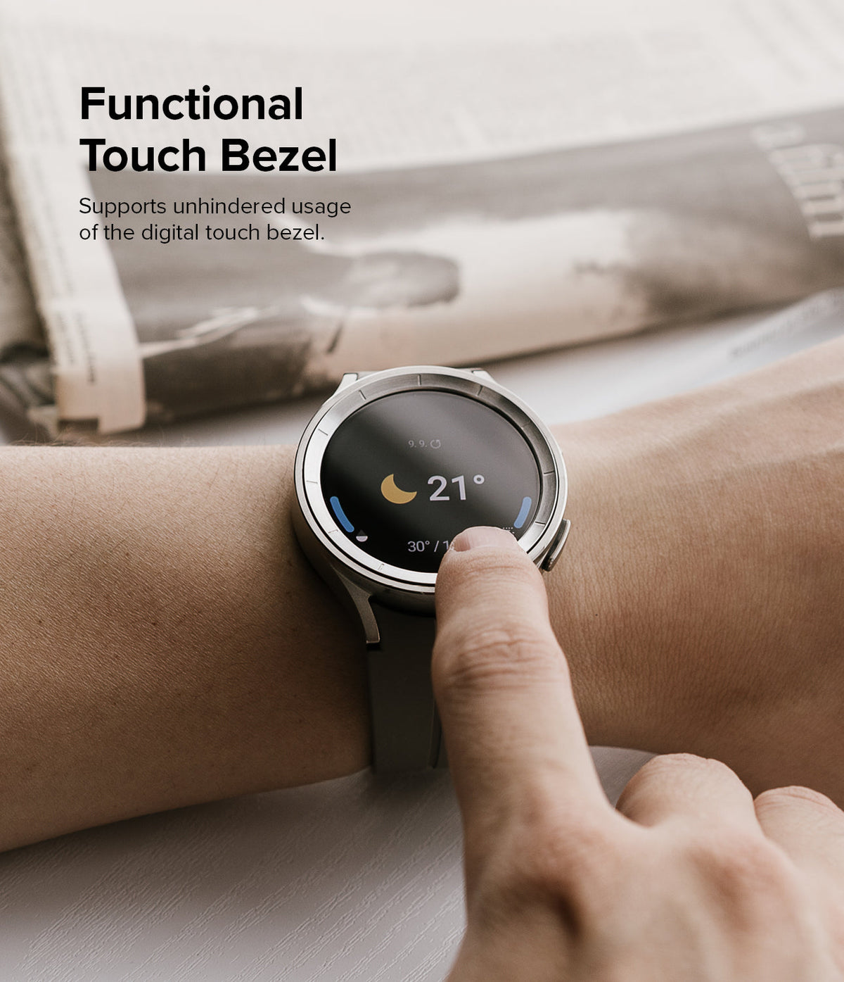 Galaxy Watch 5 Pro 45mm | Inner Bezel Styling - Galaxy Watch 5 Pro 45mm - Finger touching the digital bezel of a silver smartwatch displaying weather information.