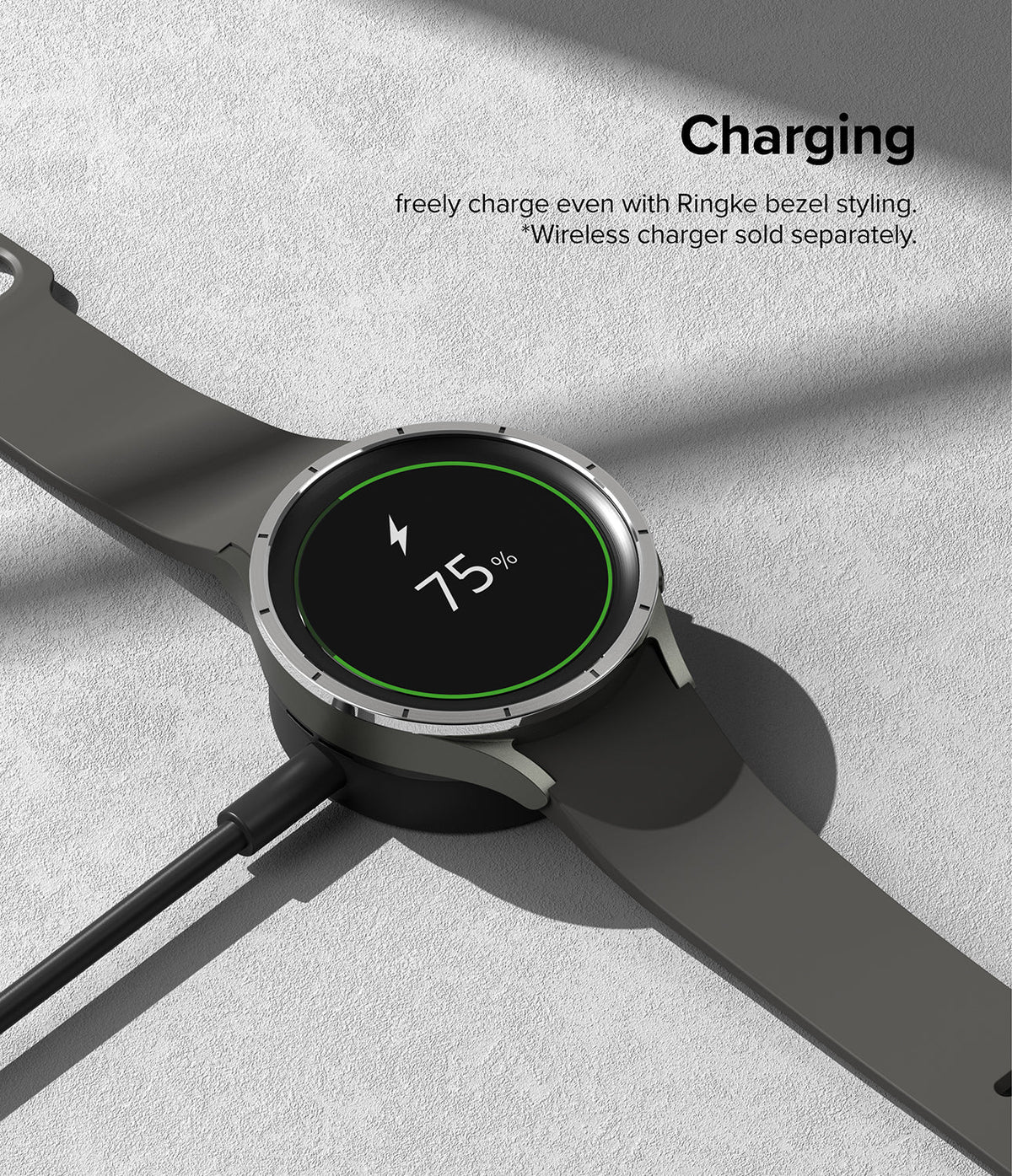 Galaxy Watch 5 Pro 45mm | Bezel Styling - A Galaxy Watch 5 Pro with a silver bezel styling charging at 75% battery.
