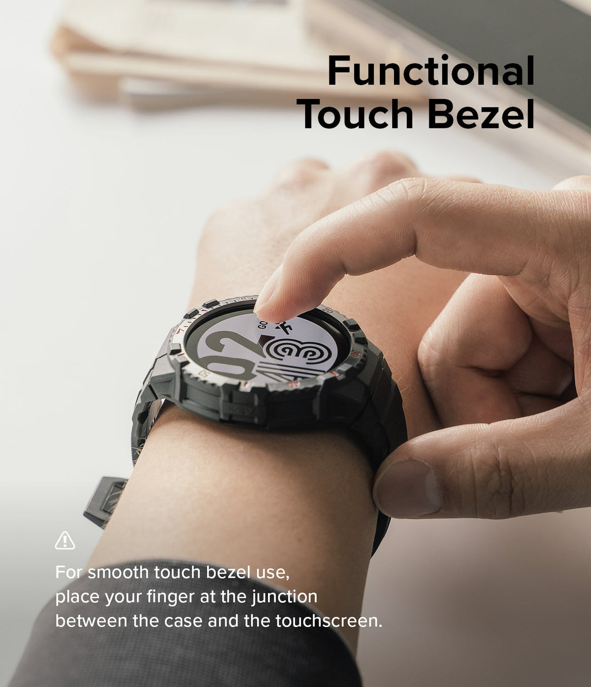 Galaxy Watch 5 / 4 (44mm) Case | Fusion-X - A finger touches the edge of a rugged black watch case on a wrist.