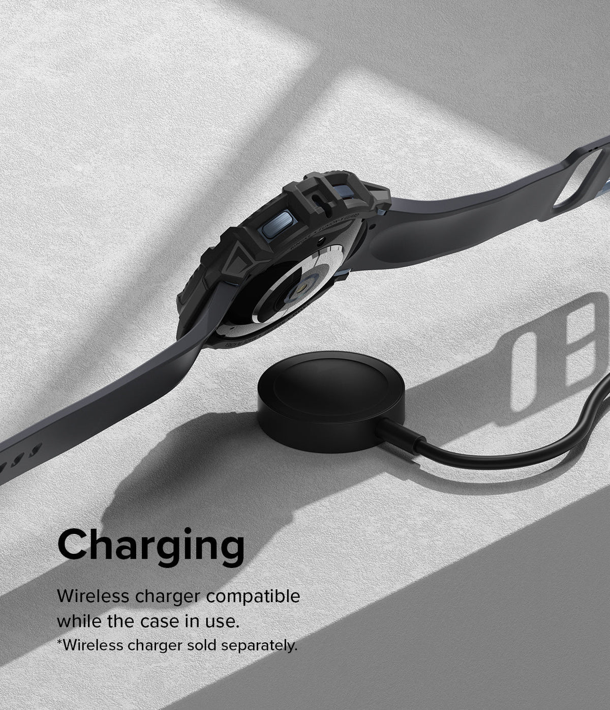 Galaxy Watch 5 / 4 (44mm) Case | Fusion-X - Smartwatch in a rugged black case hovering above a wireless charging puck.