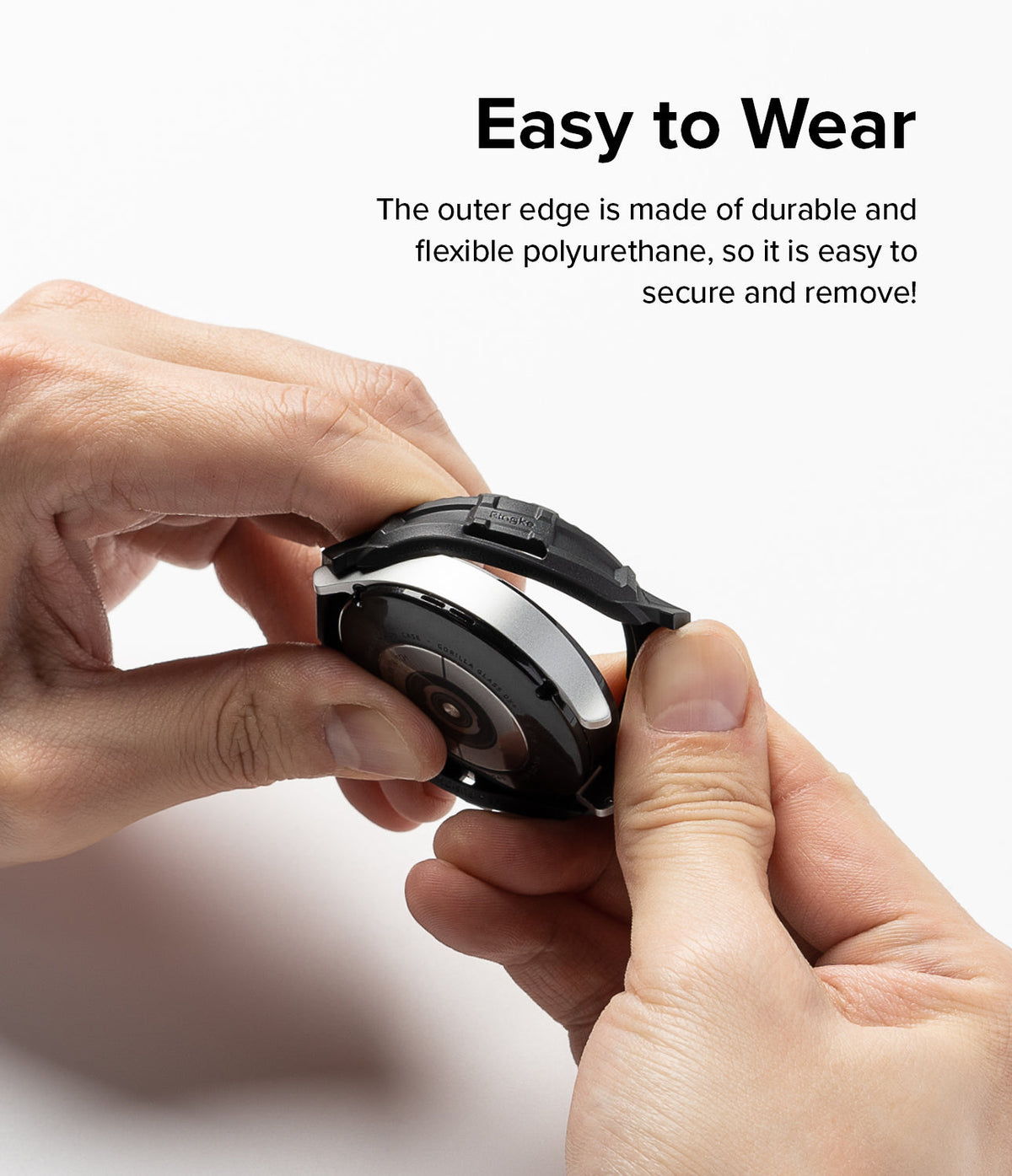Galaxy Watch 5 / 4 (44mm) Case | Fusion-X - Hands stretching a flexible black protective case onto a silver smartwatch.