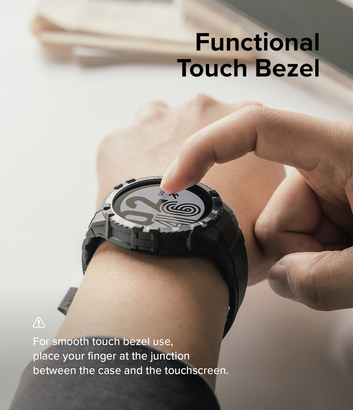 Galaxy Watch 5 / 4 (44mm) Case | Fusion-X - Finger touching the edge of a rugged black watch case on a smartwatch.