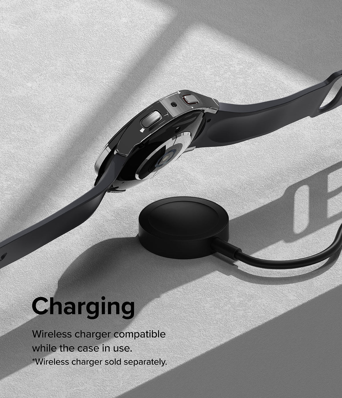 Galaxy Watch 5 44mm Case | Slim - A black Galaxy Watch 5 with a slim case hovering above a wireless charging puck.