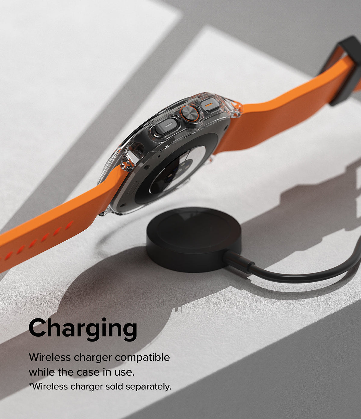 Galaxy Watch Ultra | Slim Extend & Glass - A Galaxy Watch Ultra with a clear protective case charging on a wireless puck.