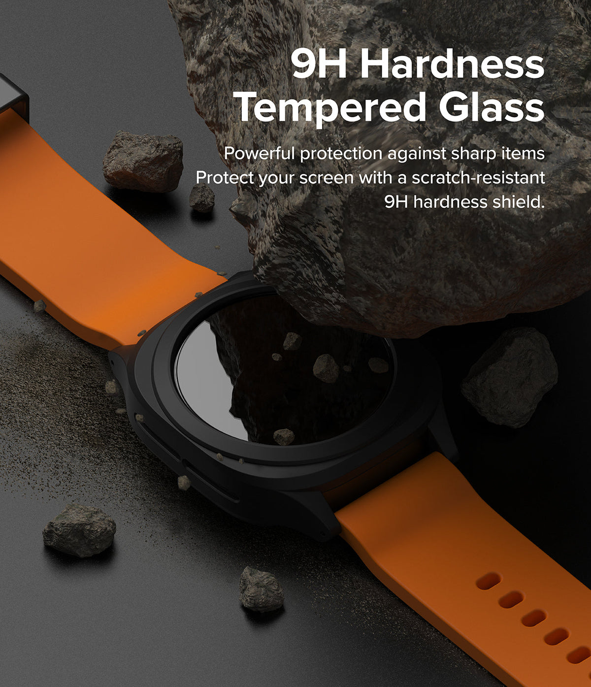 Galaxy Watch Ultra | Slim Extend & Glass - A Galaxy Watch Ultra with an orange band under a large rock, highlighting 9H tempered glass screen protection.