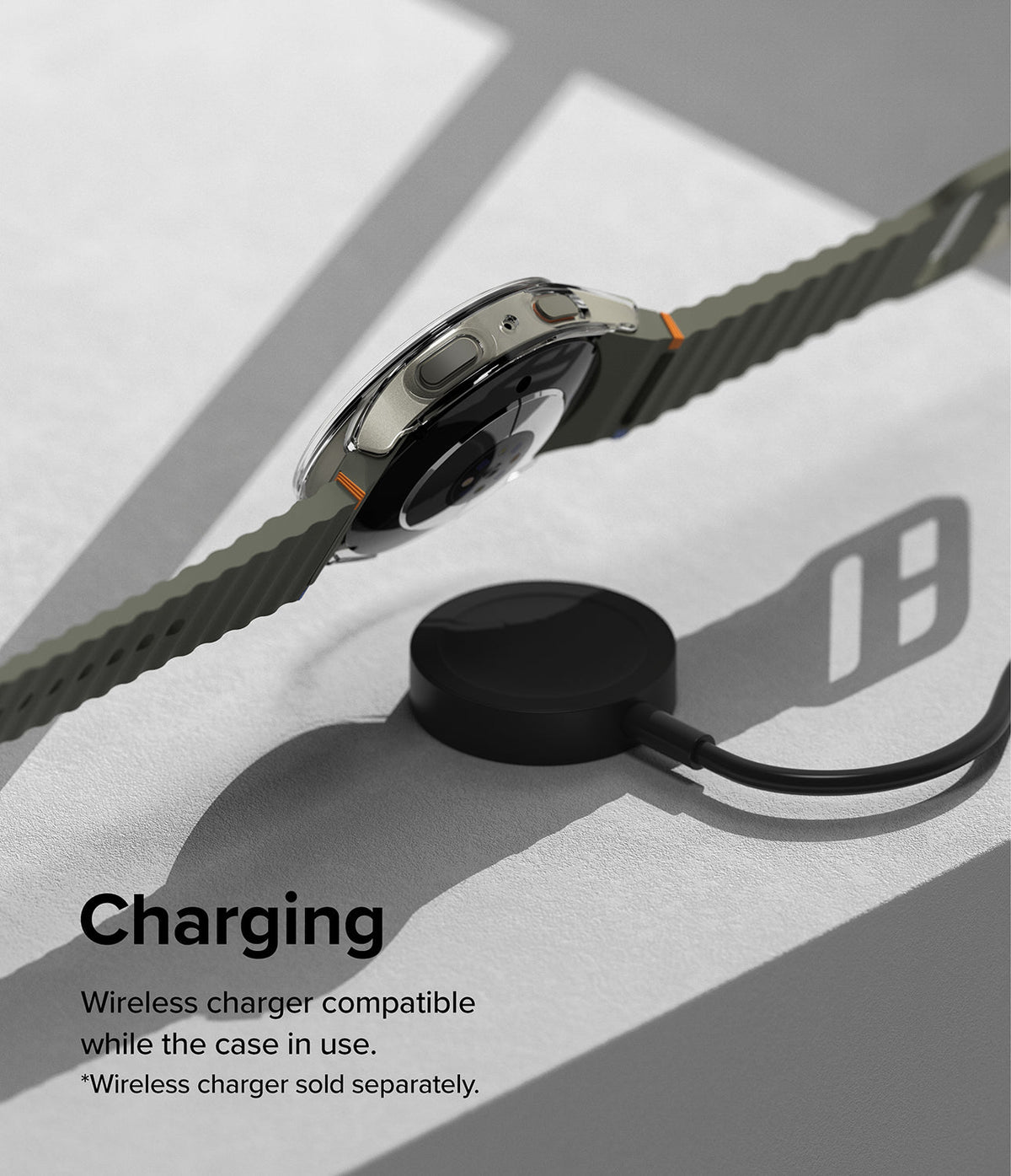 Galaxy Watch 7 (40mm) | Slim & Glass - A Galaxy Watch 7 with a clear protective case hovering above a wireless charging puck.