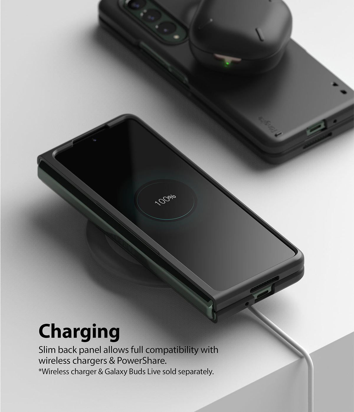Galaxy Z Fold 3 Case | Slim - Folded phone in black case charging wirelessly with earbuds on top showing 100% battery.