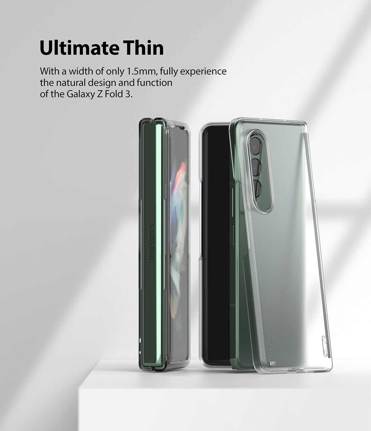 Galaxy Z Fold 3 Case | Slim - A folded Galaxy Z Fold 3 next to its slim, transparent protective case on a white surface.