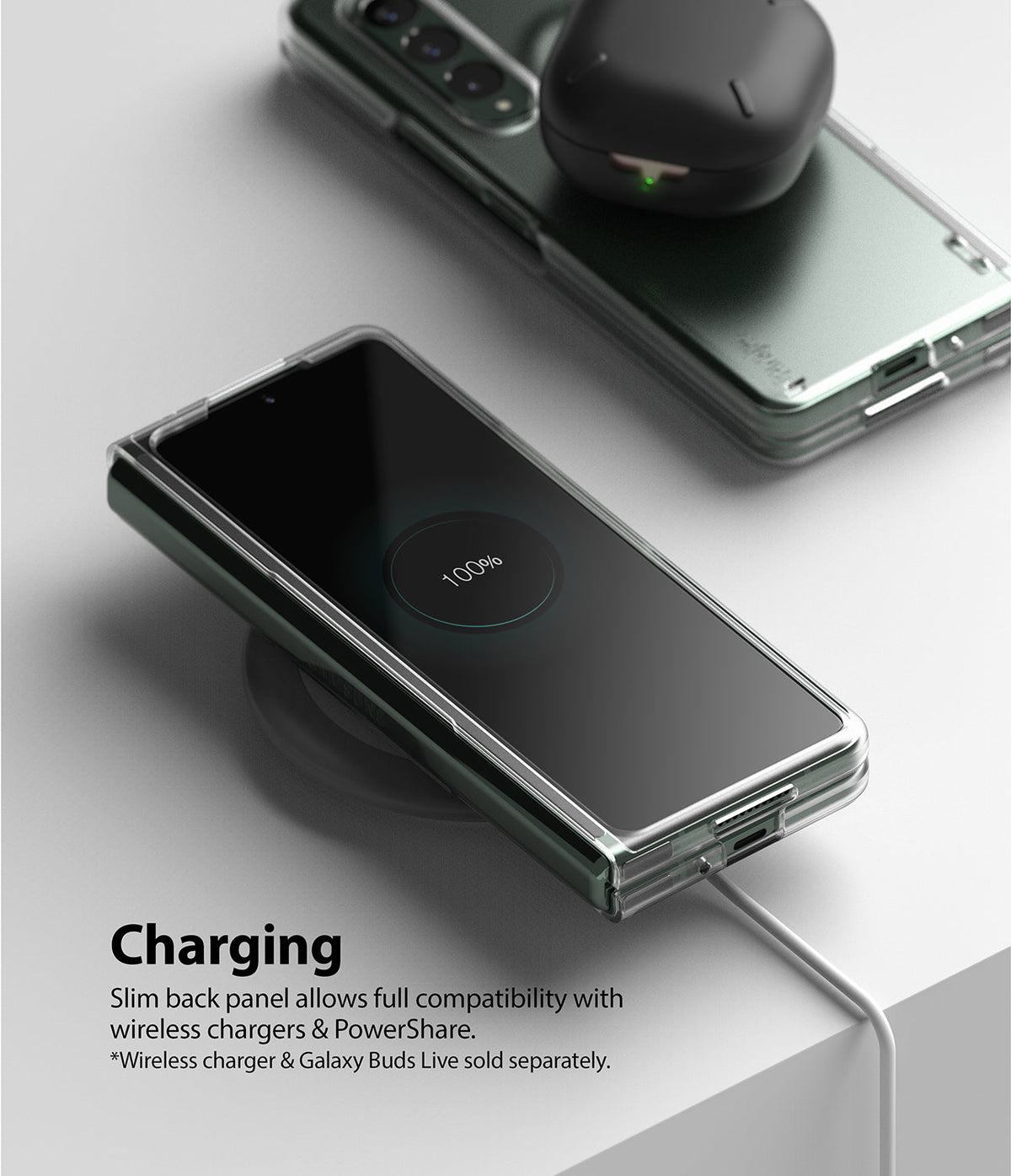 Galaxy Z Fold 3 Case | Slim - Folded phone in a clear case charging wirelessly with earbuds resting on top.