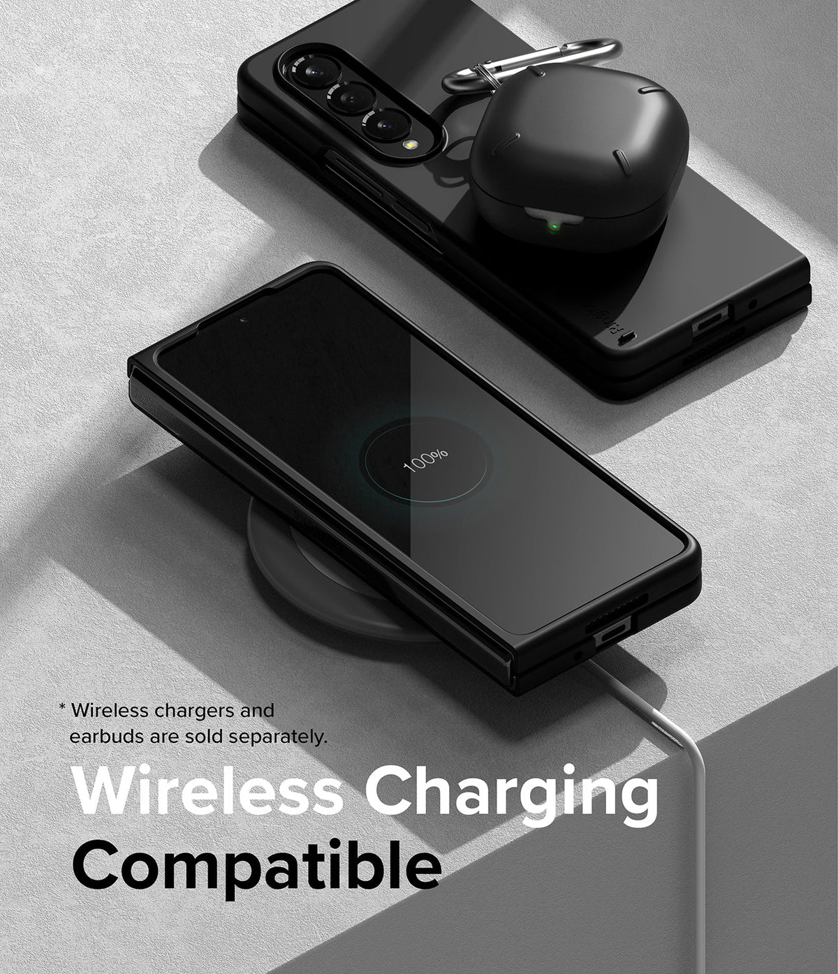 Galaxy Z Fold 4 Case | Slim - Folded phone in black case charging wirelessly with earbuds case resting on top.