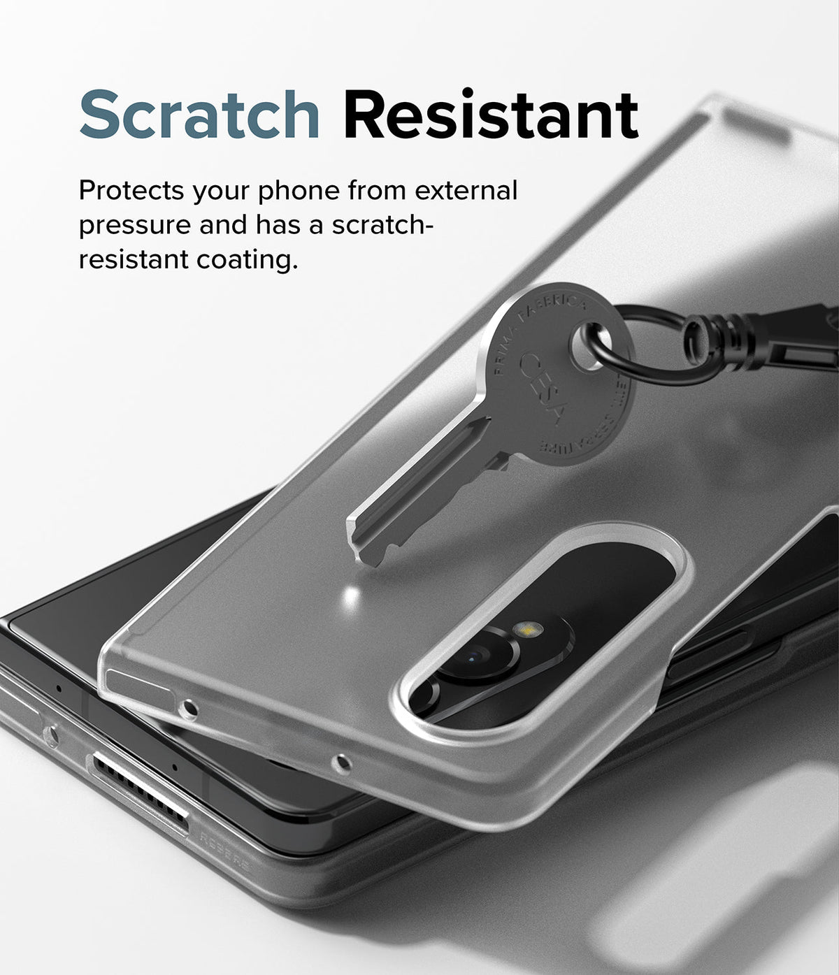 Galaxy Z Fold 4 Case | Slim - A metal key resting on a translucent, scratch-resistant Galaxy Z Fold 4 phone case.