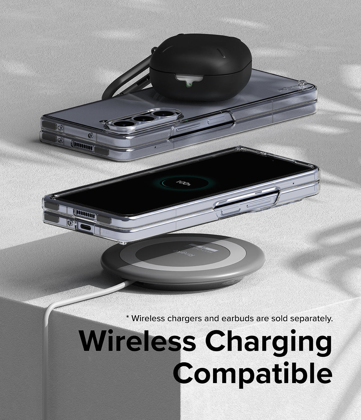 Galaxy Z Fold 5 Case | Slim - Folded phone in clear case charging wirelessly with earbuds case resting on top.