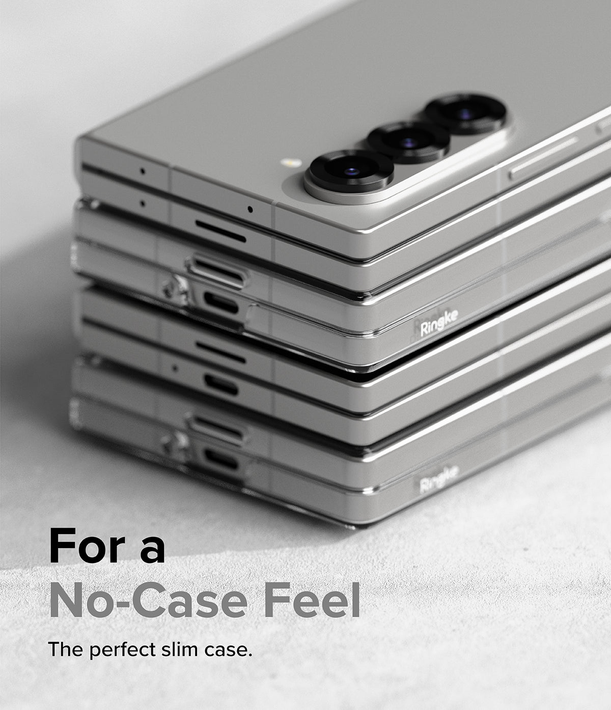 Galaxy Z Fold 6 Case | Slim - Stack of silver Galaxy Z Fold 6 phones in clear slim cases on a textured surface.