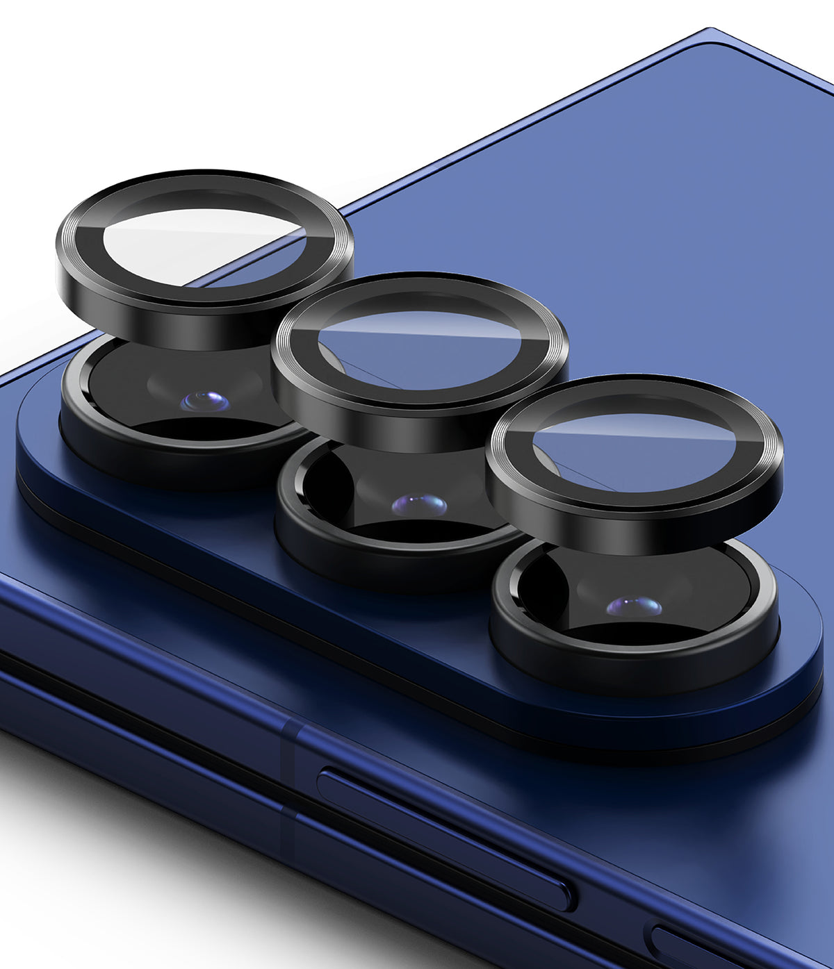 Galaxy Z Fold 7 | Camera Lens Frame Glass (2 Pack) - Three black protective glass lens covers hovering above the triple camera array of a blue smartphone.
