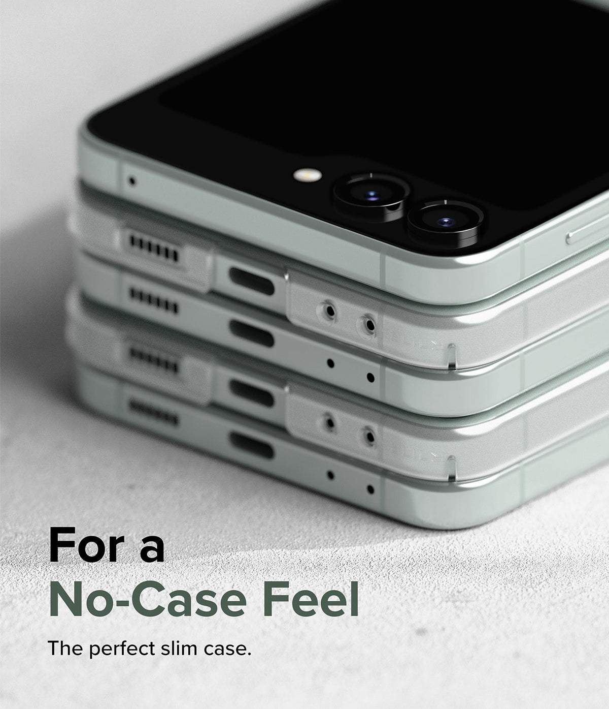 Galaxy Z Flip 5 Case | Slim - A stack of four light green Galaxy Z Flip 5 phones in slim cases on a textured surface.