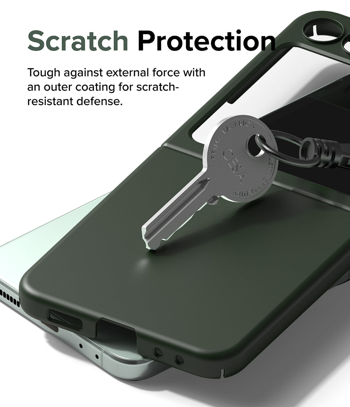 Galaxy Z Flip 5 Case | Slim Color - A metal key resting on a dark green protective phone case to demonstrate scratch resistance.