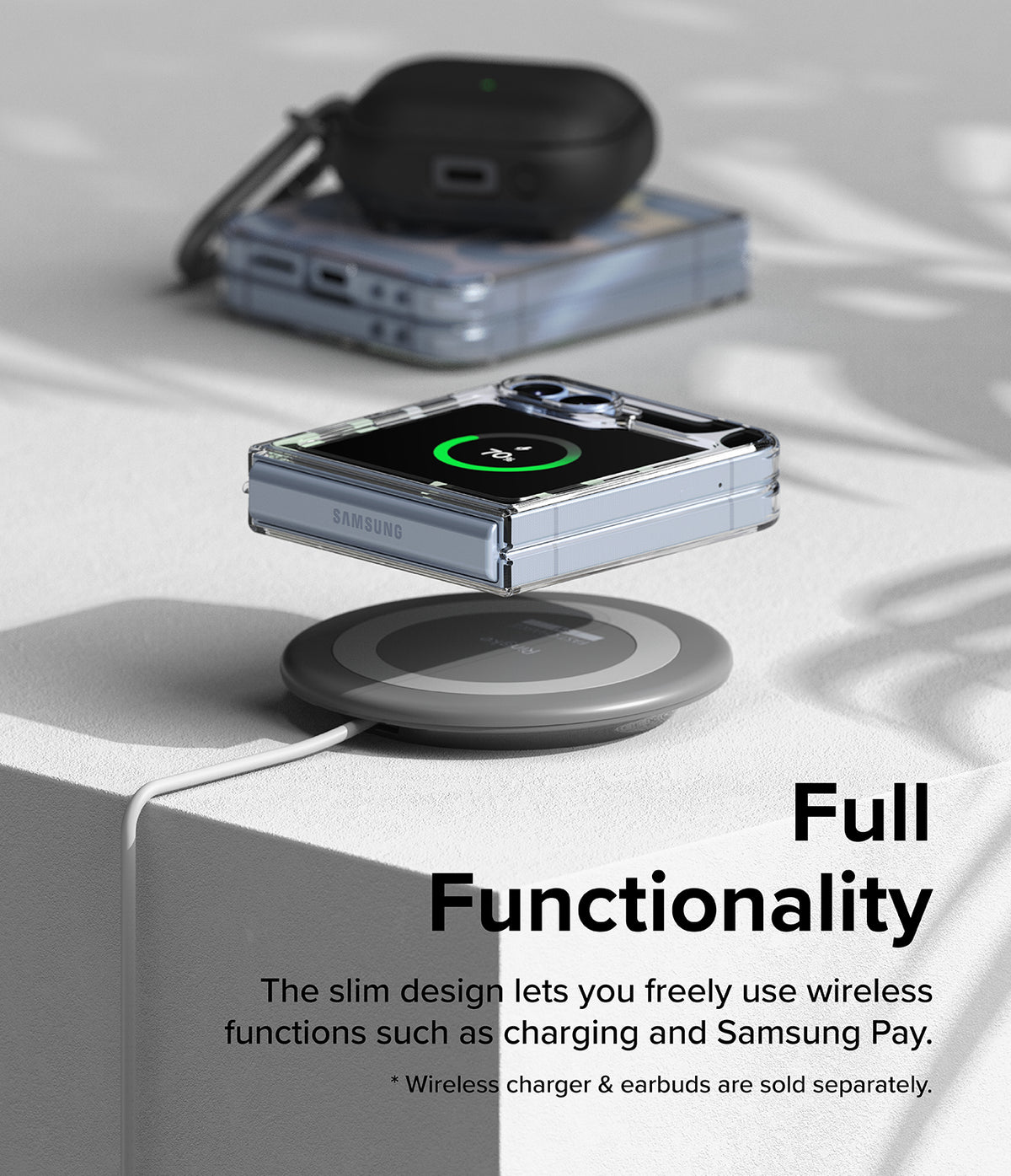 Galaxy Z Flip 7 FE Case | Fusion Design - A folded phone in a clear case wirelessly charging on a circular pad.