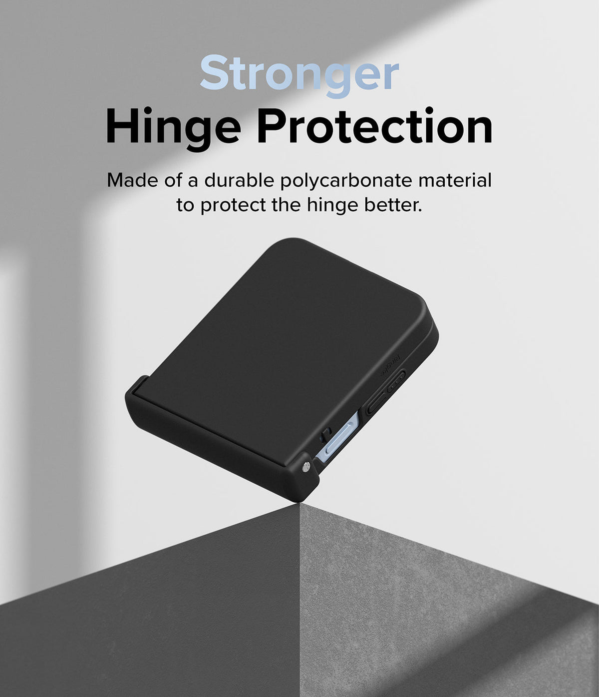 Galaxy Z Flip 7 FE Case | Slim Hinge - Black protective case on a folded phone balanced on a sharp corner edge.