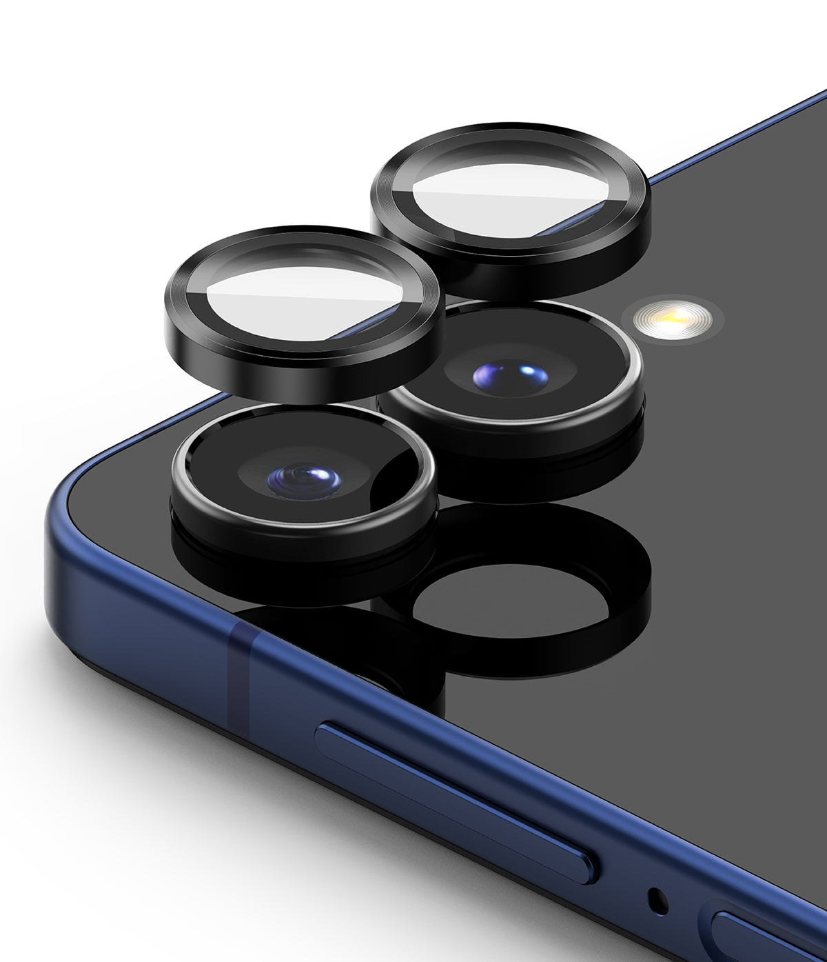 Galaxy Z Flip 7 | Camera Lens Frame Glass (2 Pack) - Two black protective lens covers hovering above a smartphone camera array.