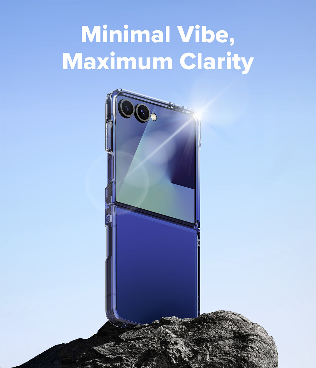 Galaxy Z Flip 7 Clear | Fusion - A clear phone case on a Galaxy Z Flip 7 standing on a rock against a bright blue sky.