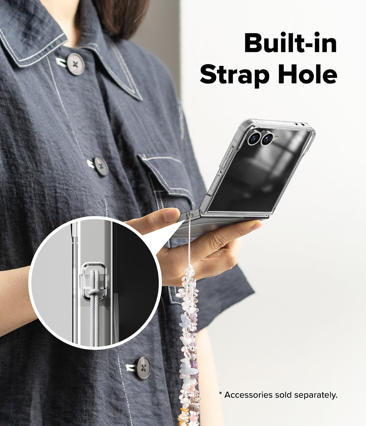 Galaxy Z Flip 7 Case | Slim Magnetic - Person holding a phone with a clear case featuring a built-in strap hole.