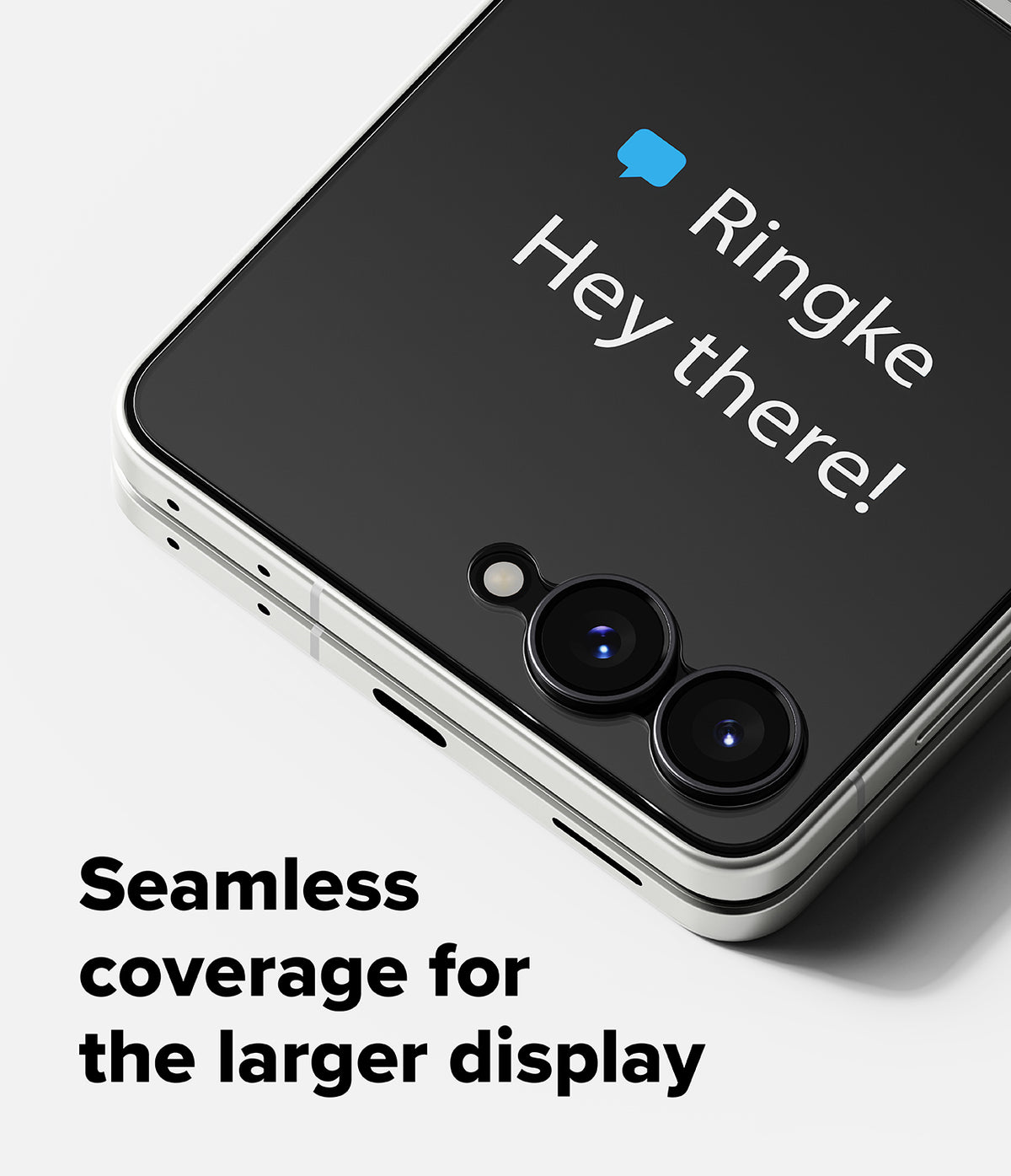 Galaxy Z Flip 8 Screen Protector | Cover Display Tempered Glass Pro (2 Pack) - Close-up of a smartphone showing a black protective screen overlay with the text 'Ringke Hey there!' and a blue speech bubble icon, plus the marketing text 'Seamless coverage for the larger display' on a light gray background.