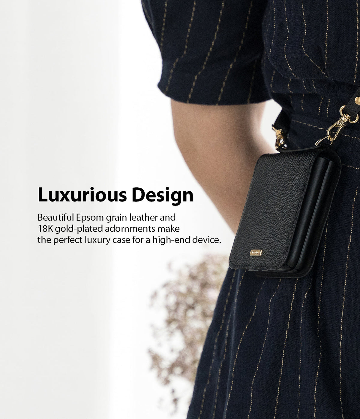 Galaxy Z Flip Case | Folio Signature Black - Black textured leather phone case with gold hardware worn on a strap.