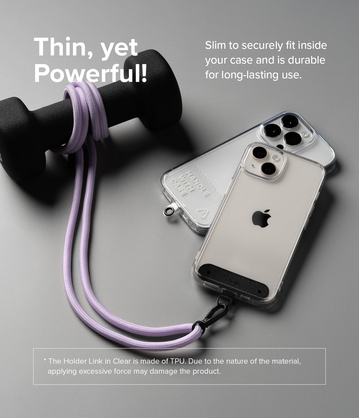 Holder Link Strap | Clear - A light purple phone lanyard wrapped around a dumbbell, attached to a clear phone case on a gray surface.