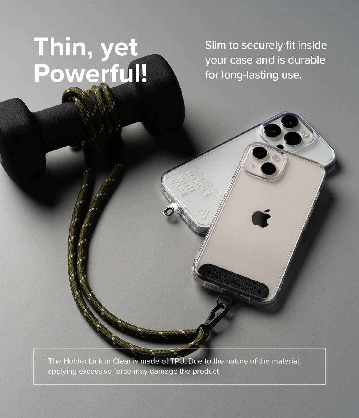 Holder Link Strap | Clear - Khaki rope strap attached to a clear phone case, resting next to a black dumbbell on a gray surface.