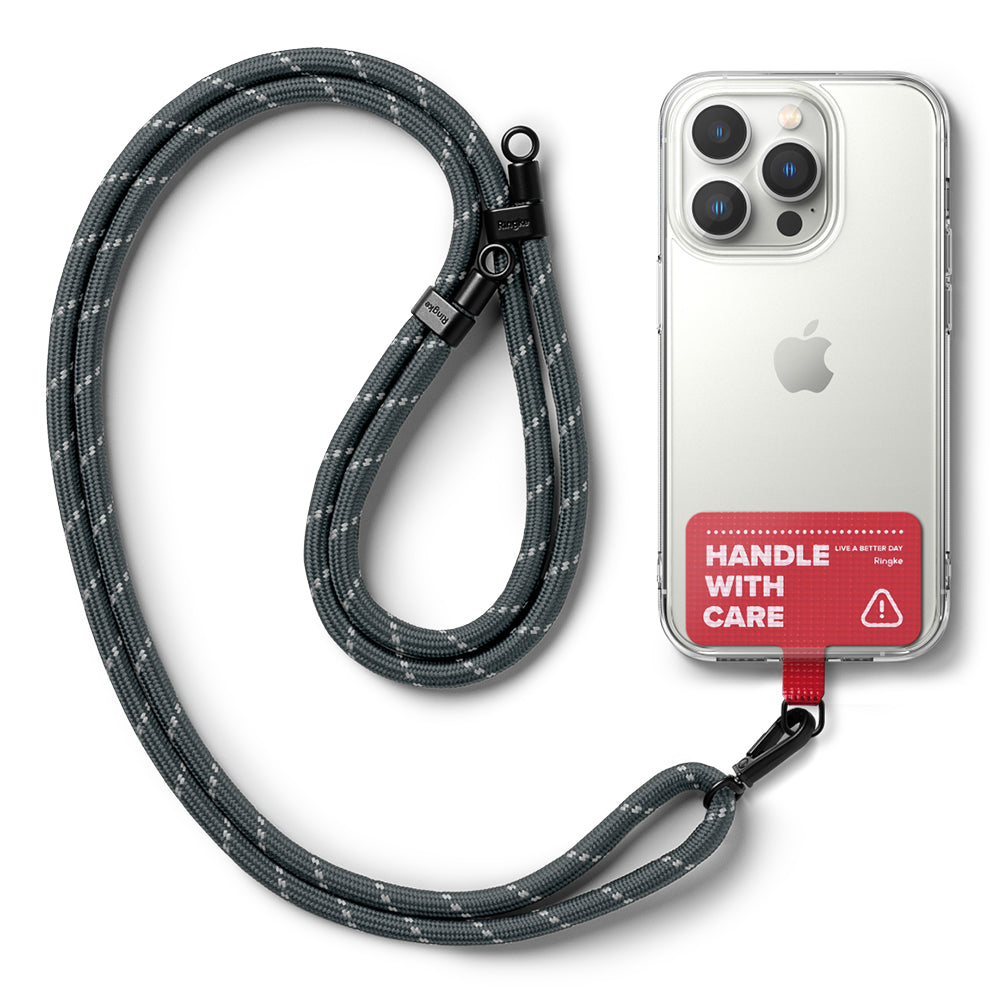 Holder Link Strap | Tarpaulin Red - Grey rope lanyard attached to a clear phone case with a red Handle With Care tab.