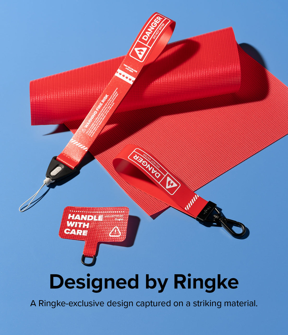 Holder Link Strap | Tarpaulin Neon Green - Two red industrial-style straps and a phone tether on a blue background.