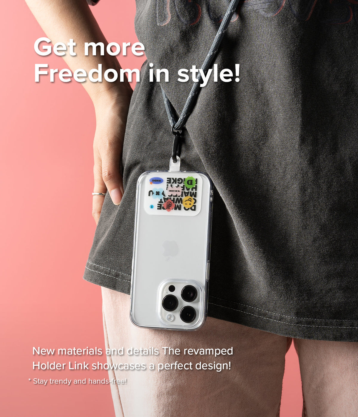 Ringke Strap Holder Link Design - A person wears a clear phone case with a sticker-adorned strap holder attached to a lanyard.