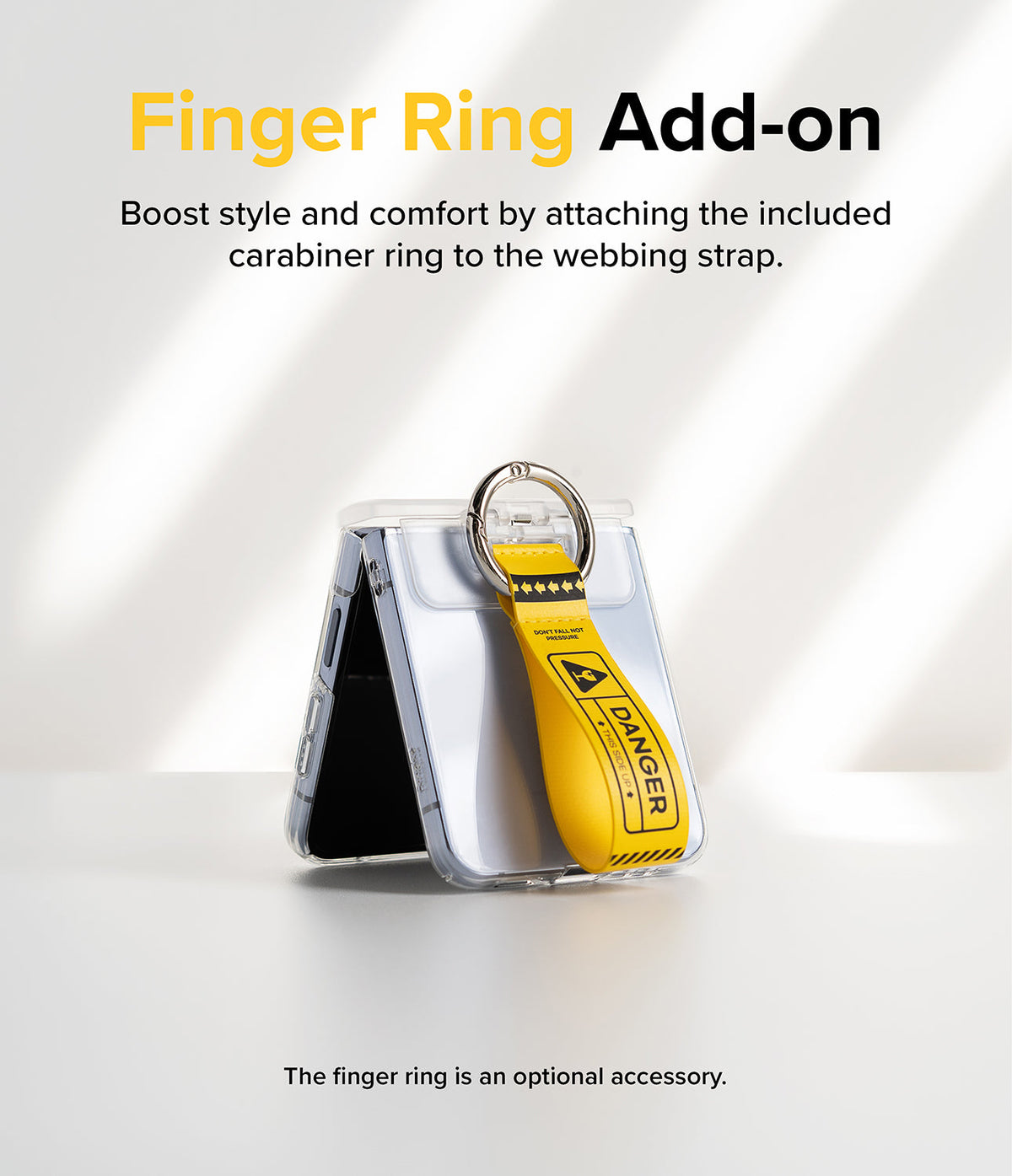 Galaxy Z Flip 7 FE / 6 / 5 / 4 / 3 | Hinge Cover Tarpaulin - Galaxy Z Flip 7 FE / 6 / 5 / 4 / 3 | A folded phone in a clear case with a yellow "DANGER" warning webbing strap.