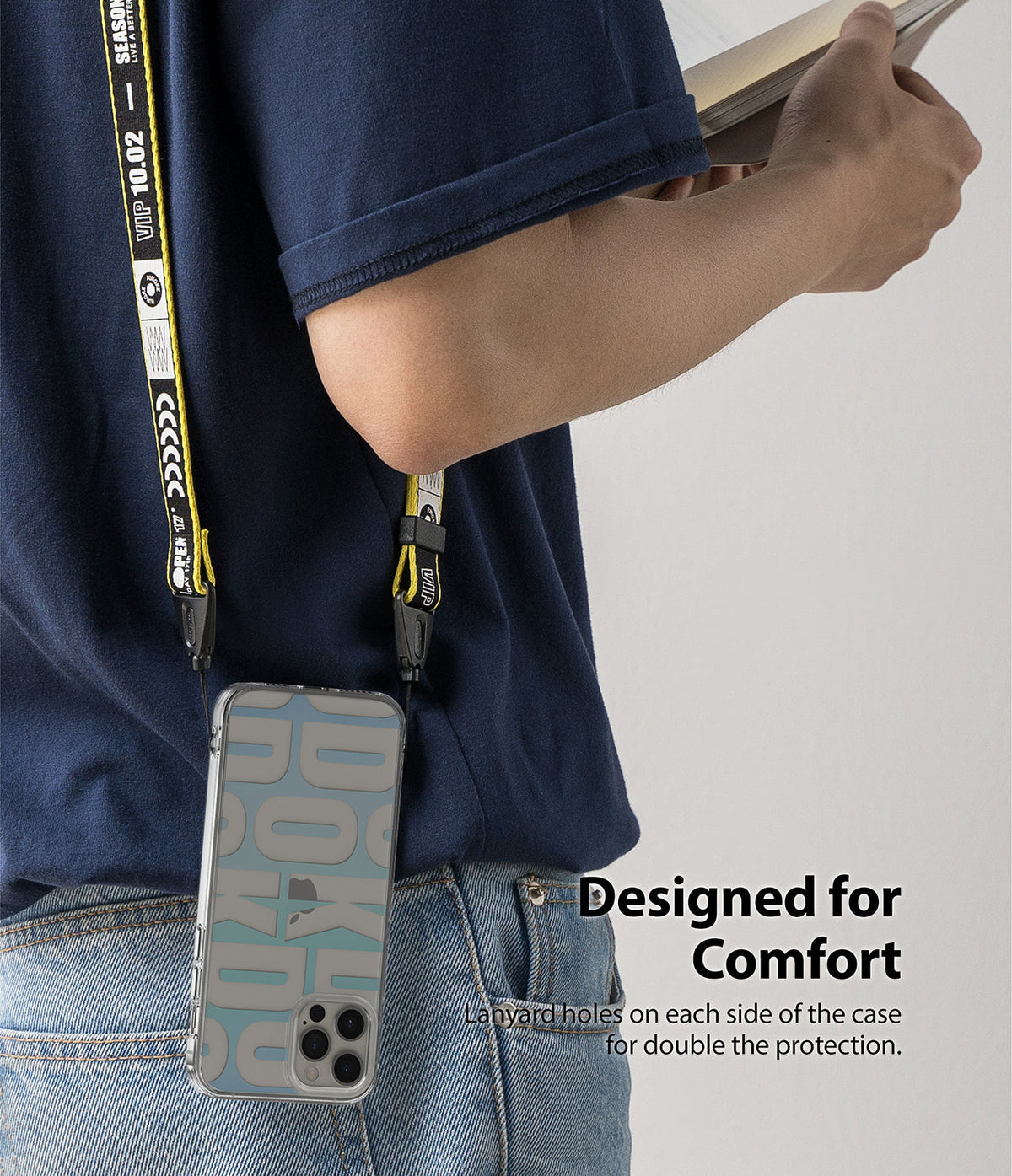 iPhone 12 Pro Max Case | Fusion Design - Person wearing a phone case with a yellow branded lanyard attached to both sides.