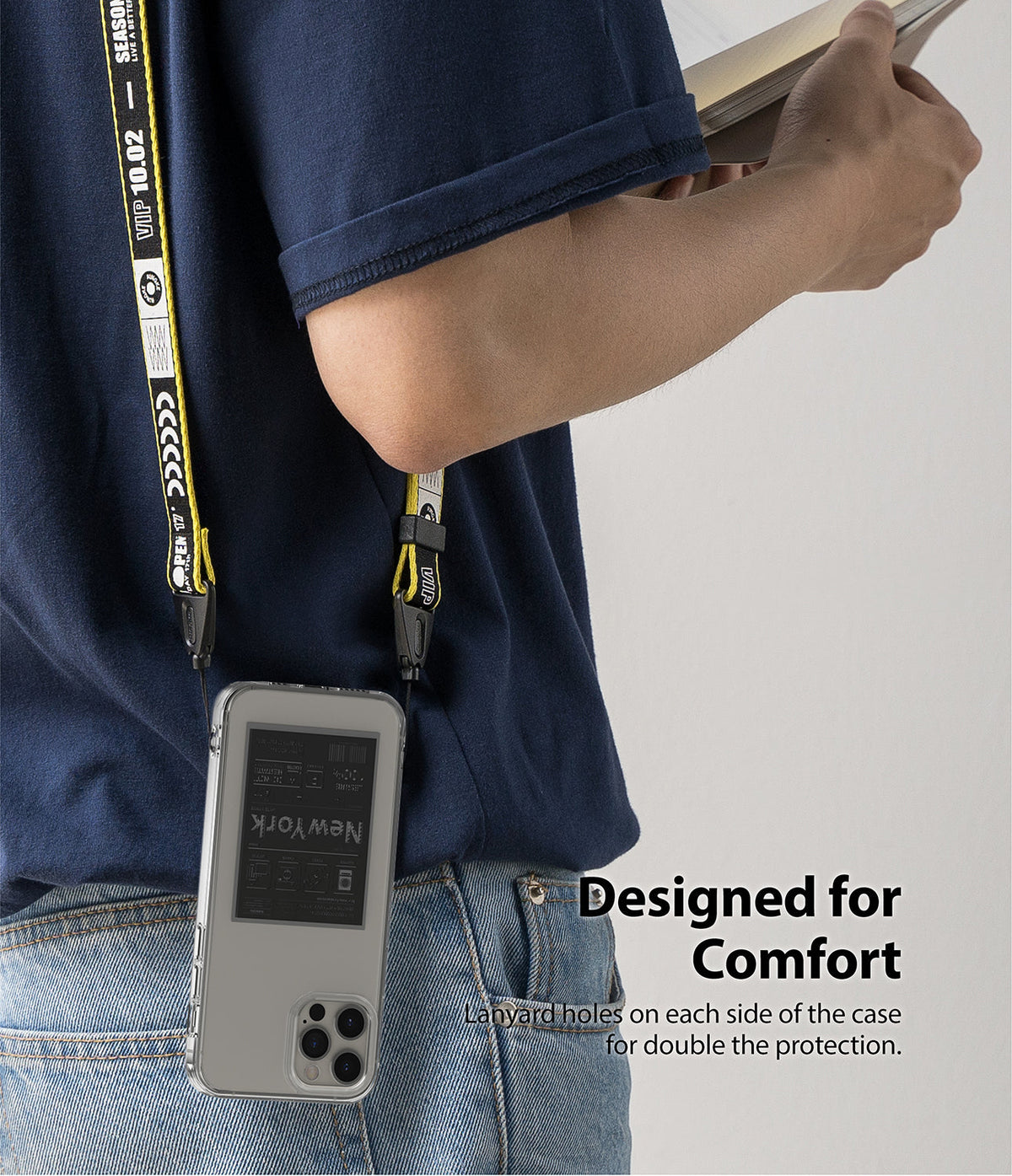 iPhone 12 / 12 Pro Case | Fusion Design - Person wearing a phone case with a yellow lanyard attached to dual side holes.