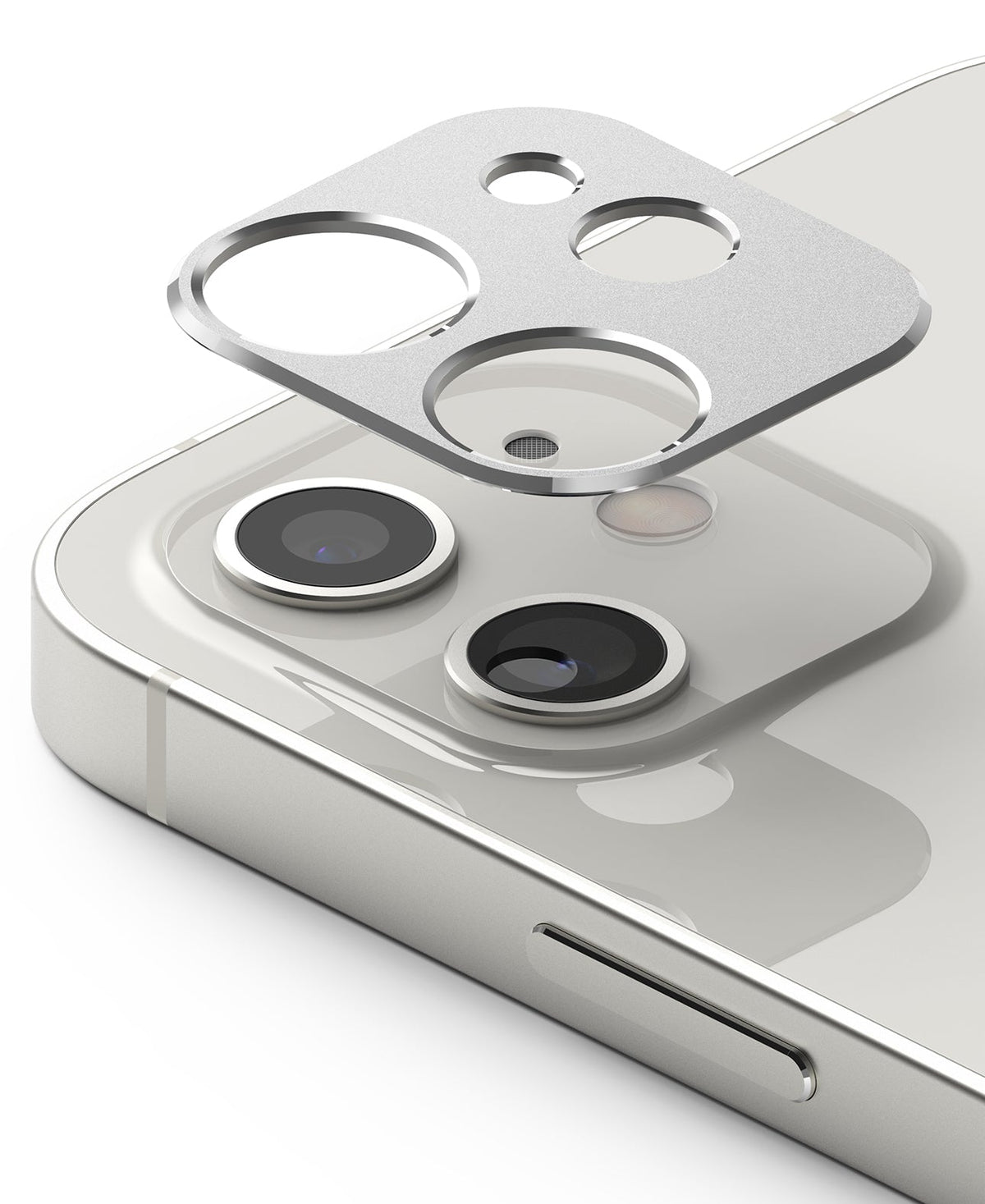 iPhone 12 | Camera Styling - Silver metallic camera lens protector hovering above the dual-lens array of a white iPhone 12.